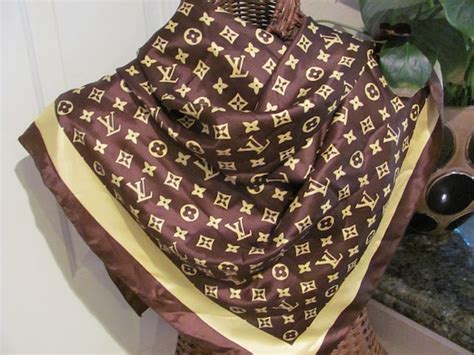 how to tell fake louis vuitton scarf|louis vuitton silk scarf vintage.